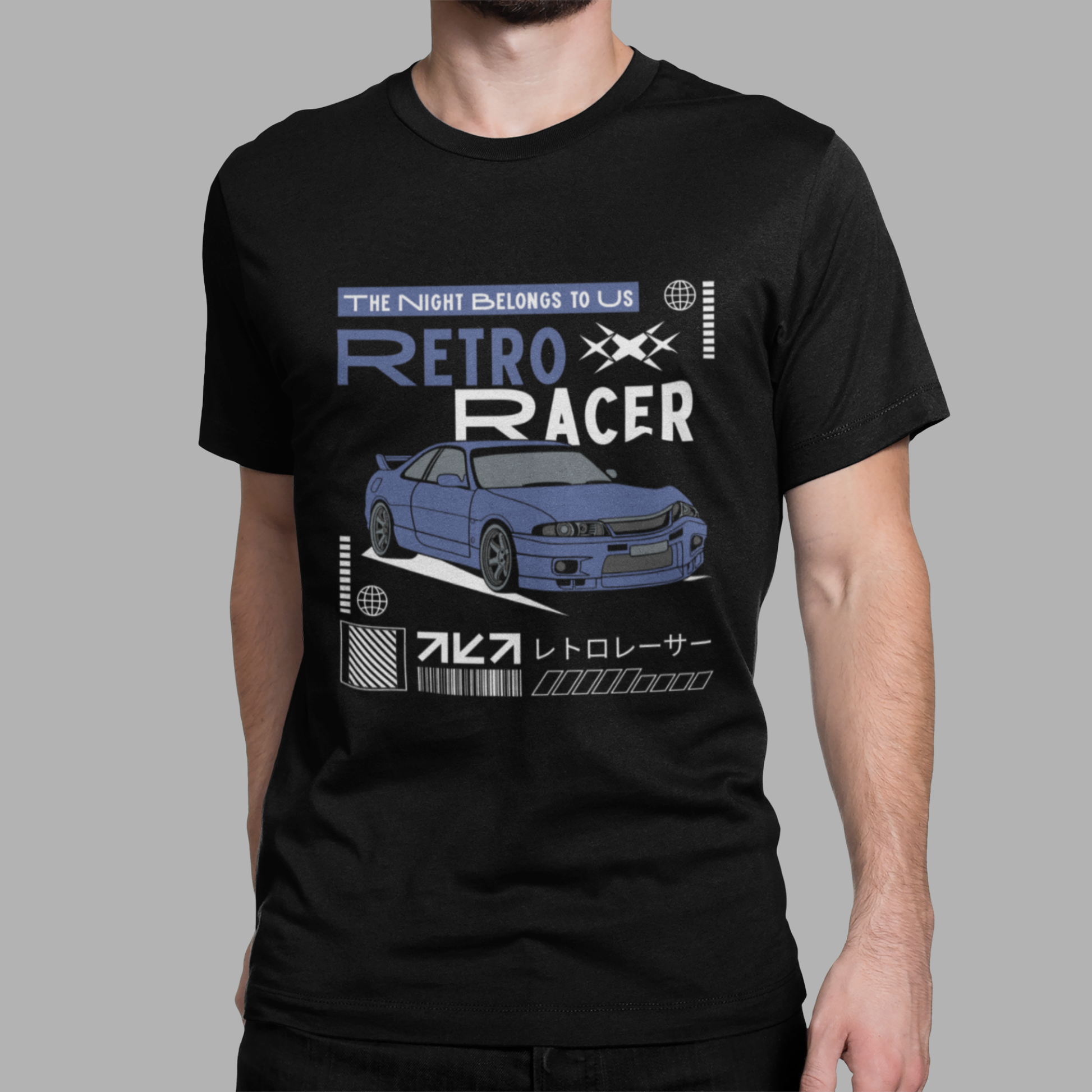 Trendy black graphic T-shirt featuring retro Japanese sports car artwork and racer typography, modeled by man.